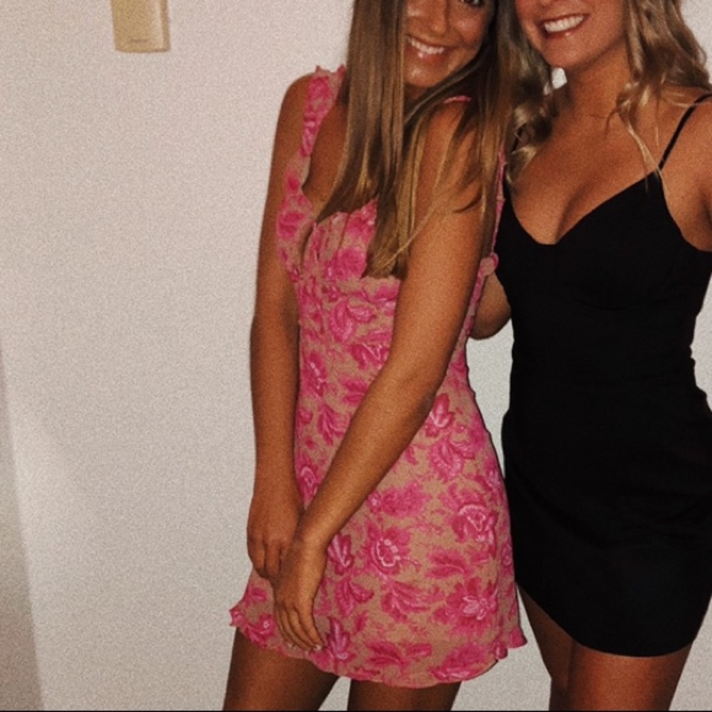 Skin tone and pink floral dress